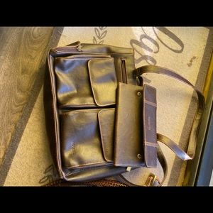 A bunch of different purses and women wallets